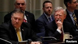 U.S. Secretary of State Mike Pompeo (left) and national security adviser John Bolton at the UN on September 24