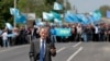 Crimean Tatar leader Mustafa Dzhemilev was met by supporters when he attempted to enter Crimea on May 3. Blocking his entry has increased tensions on the peninsula.