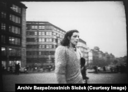 Reports on Hromadkova’s activities include detailed descriptions of her clothing. On January 5, 1984 an agent reported: “She was wearing an off-white fur cap, a dark cinnamon-colored coat, a long black scarf around her neck, green trousers, and white sports shoes…”