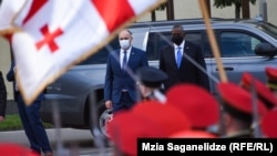 U.S. Defense Secretary Lloyd Austin (right) with Georgian Defense Minister Juansher Burchuladze in Tbilisi on October 18. 