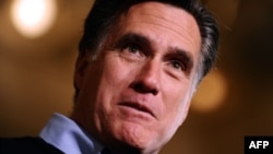 Republican presidential hopeful Mitt Romney narrowly defeated Rick Santorum in the Iowa caucuses.