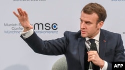 France's President Emmanuel Macron addresses the Munich Security Conference (MSC) on February 15. 