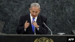 Israeli Prime Minister Benjamin Netanyahu says Tehran is attempting to develop nuclear weapons, and only a combination of tough sanctions and credible military threat could peacefully prevent it from achieving its goal.