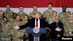 U.S. President Donald Trump delivers remarks to U.S. troops during an unannounced visit to Bagram Air Base in November.