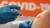 A person receives a dose of the Sputnik V vaccine against COVID-19 at an inoculation center in a shopping mall in St. Petersburg. (file photo)