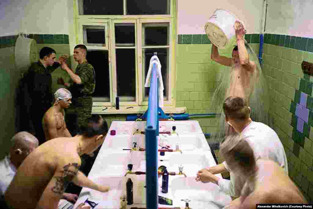 Soldiers return to their quarters, which have no hot water or showers, after a long day outside in subzero temperatures.