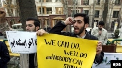 Iranian students stage a demonstration outside the UN office in Tehran in 2006 to protest one of the four rounds of international sanctions targeting Iran's nuclear activities.