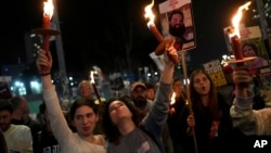 Relatives and friends of people killed and abducted by Hamas and taken into Gaza, react to the cease-fire announcement as they take part in a demonstration in Tel Aviv, Israel, on January 15.