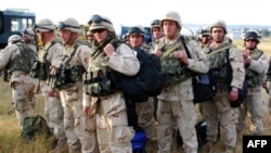 Georgian soldiers arrive back in Tbilisi in August 2008