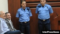 Vano Merabishvili (left) and Zurab Chiaberashvili appear in court in Kutaisi on May 22.