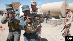 Afghan National Police are trained by a Czech provincial reconstruction team in Pul-e Alam in Logar Province in 2009.