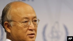 IAEA Director-General Yukiya Amano said it was his duty to "alert the world" about suspected Iranian efforts to develop atomic bombs.