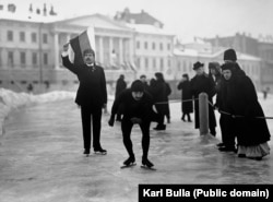 An ice-skater waits for the starting call in a race in St. Petersburg in the early 1900s.