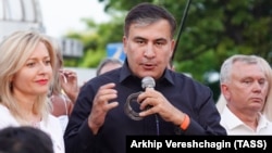 Mikheil Saakashvili speaks during a meeting with his supporters in Odesa on June 19.