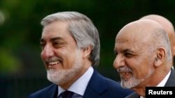 Afghanistan's President Ashraf Ghani (right) with the country's Chief Executive Abdullah Abdullah (file photo)