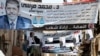 Banners of Egypt's Muslim Brotherhood candidate, Muhammad Morsi (front) and his rival, former leader Hosni Mubarak's last prime minister, Ahmed Shafiq, decorate a street in Cairo.