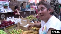 A trader at an agricultural market in the Armenian capital, Yerevan.