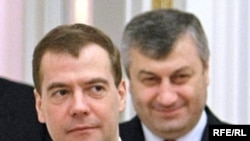 South Ossetian leader Eduard Kokoity (right, seen with Russian President Dmitry Medvedev) accused the protesters of lacking patriotism and following orders from a Moscow businessman.