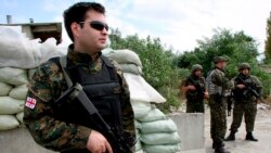 Georgian soldiers on the road near the village of Ergneti in South Ossetia on August 5