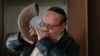 Zabulon Simantov, who was the last member of Afghanistan's once-thriving Jewish community, blows the traditional shofar, or ram's horn, at a synagogue in Kabul.