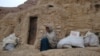 Gulsom, a 34-year-old mother of seven, has been living in the Bamiyan caves for more than five years.