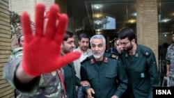 Qassem Suleimani (center), head of the Islamic Revolutionary Guards Corps' Quds Force, attends a remembrance ceremony for fallen Quds Force troops in Iran in October.