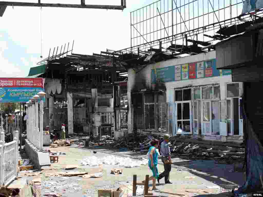 Burned-out stores in Osh city center