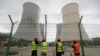 Workers fix barbed wire on a fence surrounding the Rooppur Nuclear Power Plant in Ishwardi in Bangladesh on October 4. 