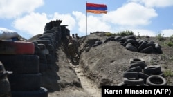 Armenian soldiers at a border checkpoint between Armenia and Azerbaijan near the village of Sotk. (file photo)