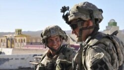 U.S. Staff Sergeant Robert Bales (left)