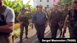 Tengiz Kitovani (center) is seen in the city streets following heavy fighting in Georgia's breakaway region of Abkhazia in 1992.