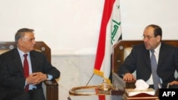 Iraqi Prime Minister Nuri al-Maliki (right) meets with Yunadim Kanna, a Christian member of parliament, last month.