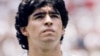 Diego Maradona holds up the trophy after Argentina beat West Germany 3-2 in the World Cup soccer final in Mexico City on June 29, 1986.