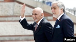 Is the "national unity" government of President Ashraf Ghani (left) and Chief Executive Abdullah Abdullah divided beyond repair?