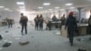 Video from the site shows ransacked offices with broken furniture and computers.