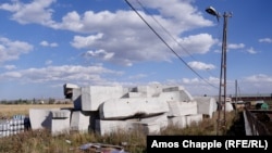 The slabs of concrete that once made up the statue