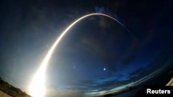 A rocket carrying cargo for the International Space Station blasts off from the launching pad at Tanegashima Space Center in Japan.