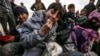 Syrians fleeing the northern embattled city of Aleppo are pictured in a camp near the Turkish border.