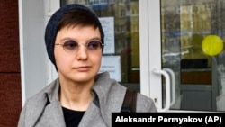 Yulia Tsvetkova leaves after a court session in Komsomolsk-on-Amur on April 12, 2021.