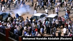 Sudanese demonstrators gather in Khartoum for antigovernment protests last month.