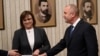 The leader of the Bulgarian Socialist Party, Cornelia Ninova (left), returns the mandate to form a government to President Rumen Radev (right) during their meeting in Sofia on September 7.