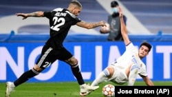 Sheriff Tiraspol's Dimitris Kolovos glides past Real Madrid's Miguel Gutierrez during the Moldovan club's shock away victory over the Spanish giants at the Santiago Bernabeu Stadium last month. 