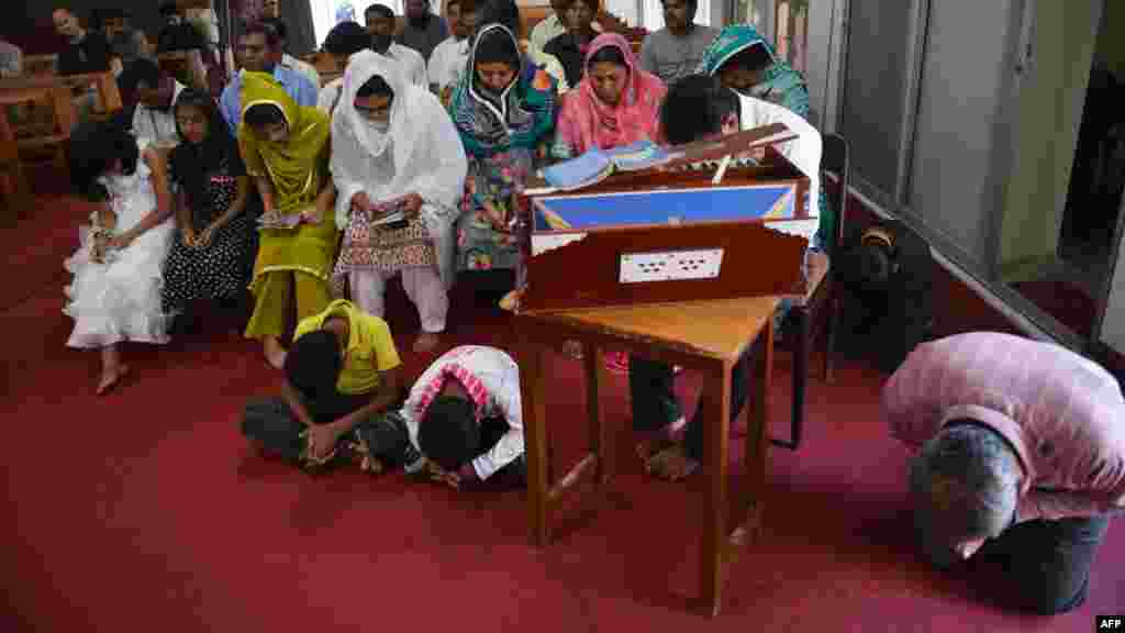 Christians attend a mass praying for the early recovery of Malala at Fatima Church in Islamabad.