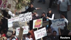 Protesters on April 21, the day that Syria lifted emergency rule, gather on a square in the southern city of Daraa.