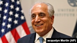 U.S. envoy Zalmay Khalilzad prepares to speak on the prospects for peace at the U.S. Institute of Peace in Washington on February 8.