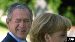 George W. Bush and Angela Merkel