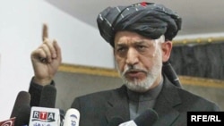 President Hamid Karzai speaks to tribal leaders in Kandahar. His recent controversial comments might be intended mainly for a domestic audience.