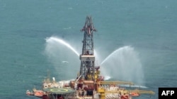 An Iranian oil rig in the Caspian Sea. Iran is a major oil exporter, but sanctions have taken a toll on the industry.