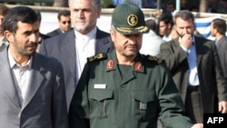 Is Revolutionary Guard chief General Mohammad Ali Jafari (right) showing President Mahmud Ahmadinejad and the hard-liners the way?