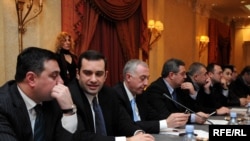 Opposition leaders (from 2nd left) Irakli Alasania, Davit Gamkrelidze, Davit Usupashvili, and Levan Gachechiladze meeting in a Tbilisi hotel last year.